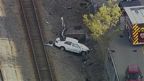 Driver dies after Commuter Rail train collides with car in Abington